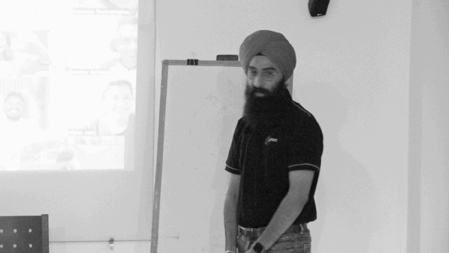 A team member in front of a whiteboard