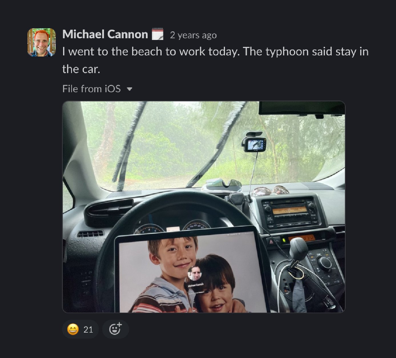 Michael working from his car on the beach