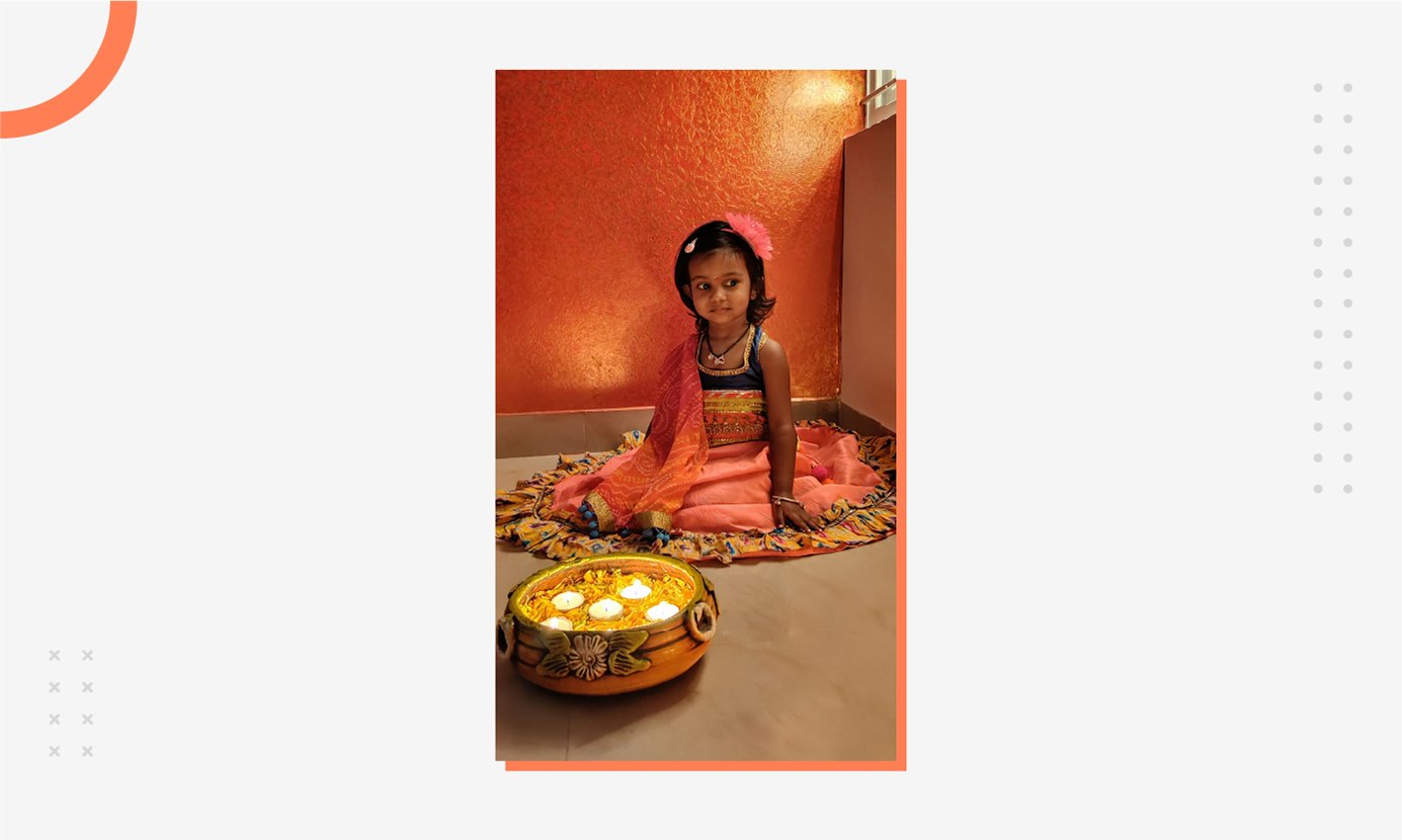 Mishti dressed in orange