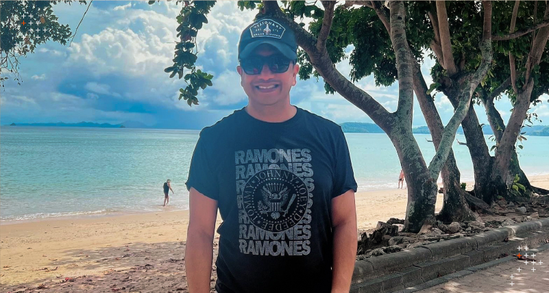 Axelerant CEO Ankur Gupta on a beach. 